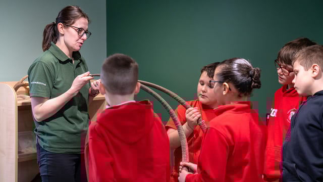 Image of school kids with send in artefact session v2 03 26